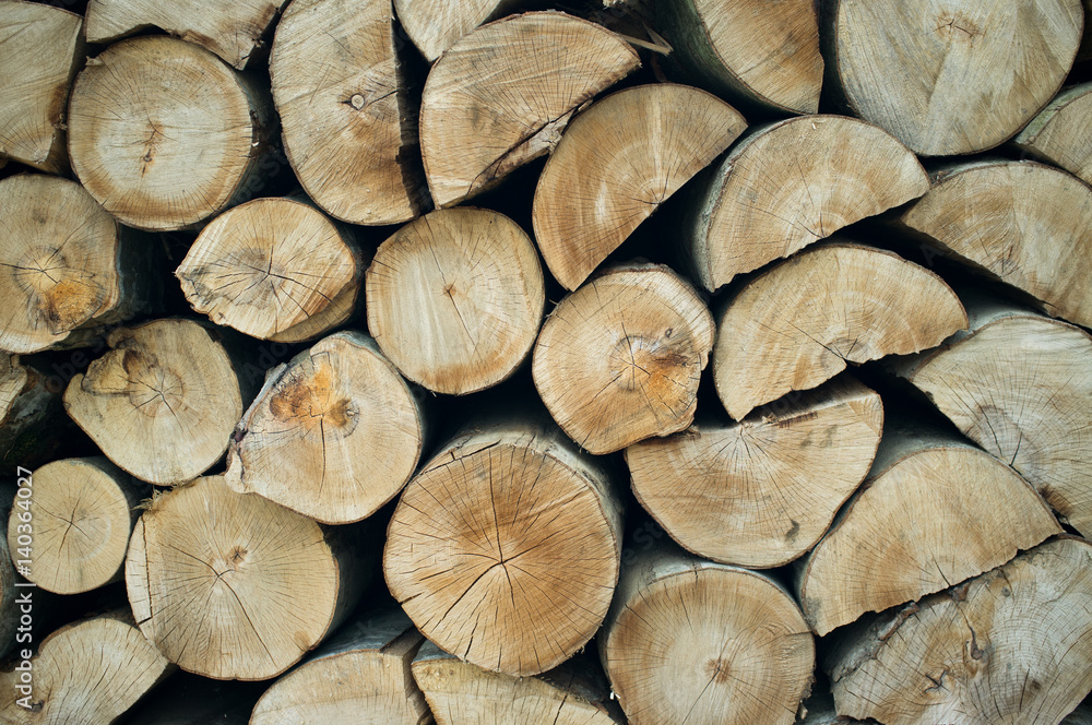 Natural wooden background, closeup of chopped firewood. Natural wooden background, closeup of chopped firewood.