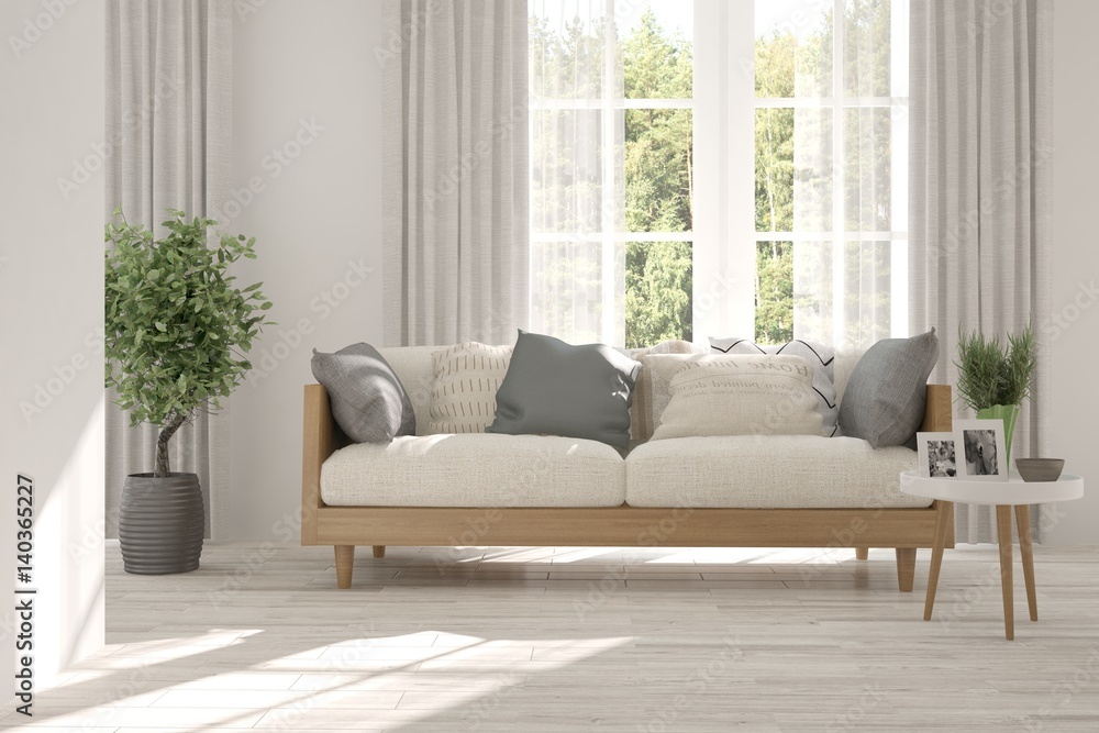 Fototapeta premium White room with sofa and green landscape in window. Scandinavian interior design. 3D illustration