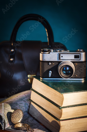 Bild auf Leinwand Camera, books, clock and road map