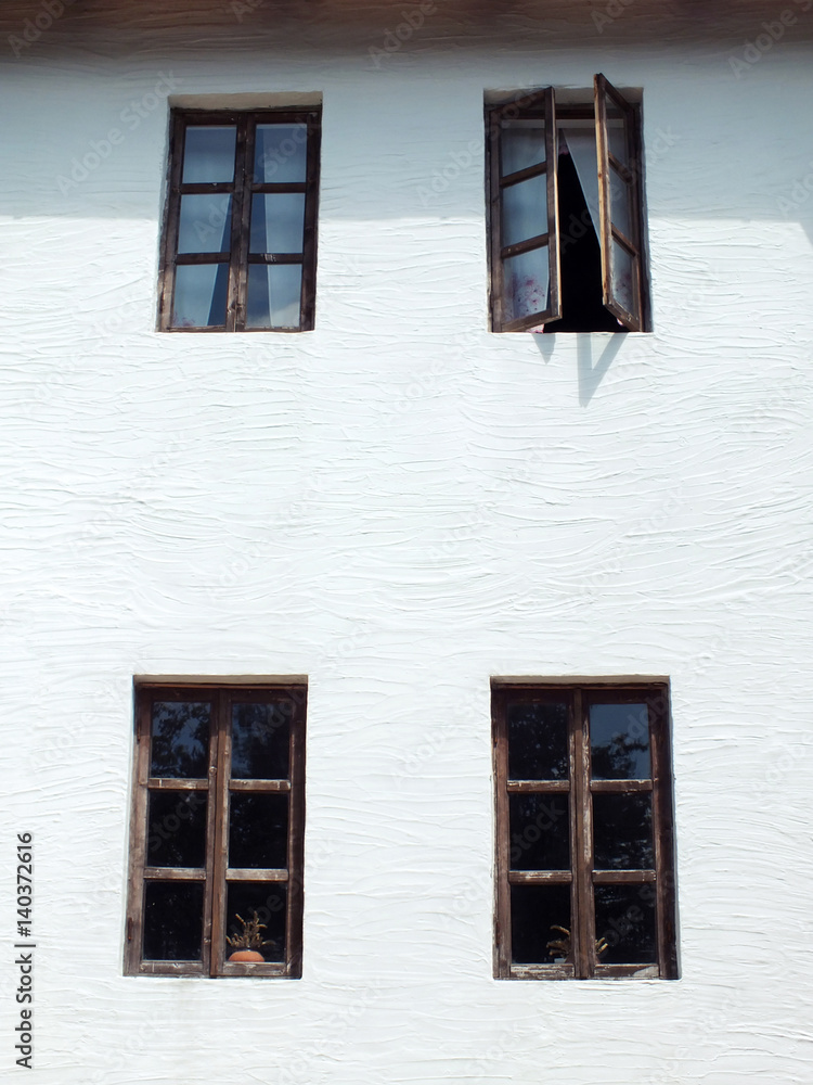 Vintage windows on a white wall background