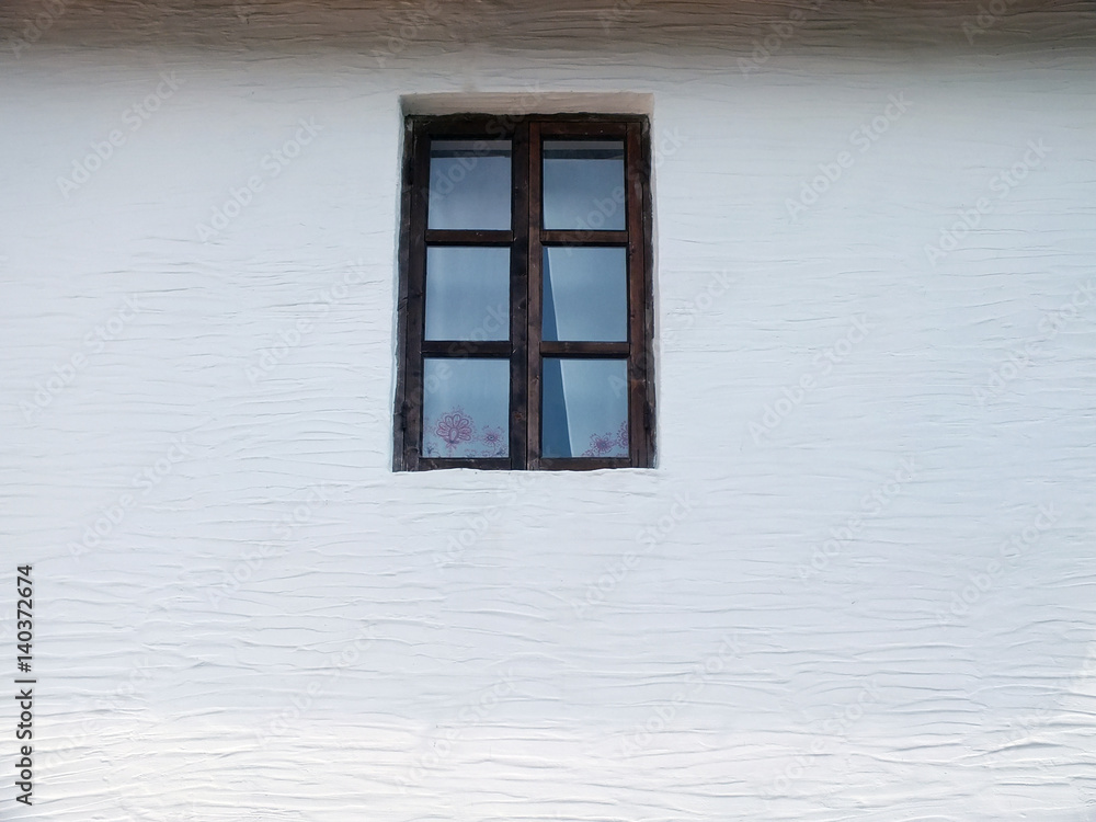 Obraz premium Vintage window on a white wall background