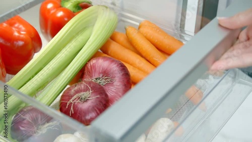 Groceries in fridge in slow motion