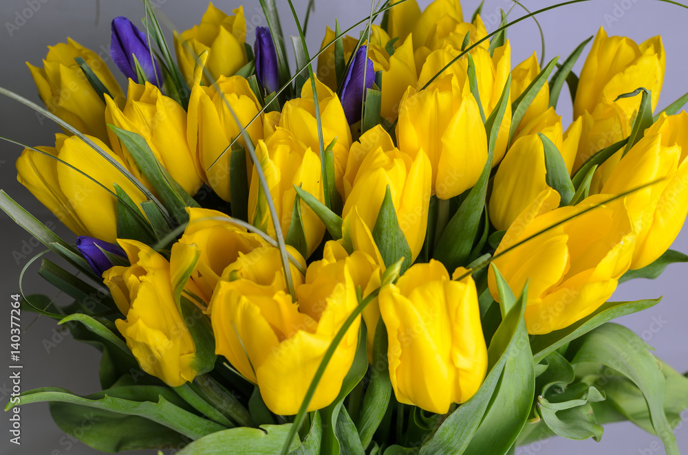 Fresh yellow tulips and a cup of coffee Fresh yellow tulips and a cup of coffee