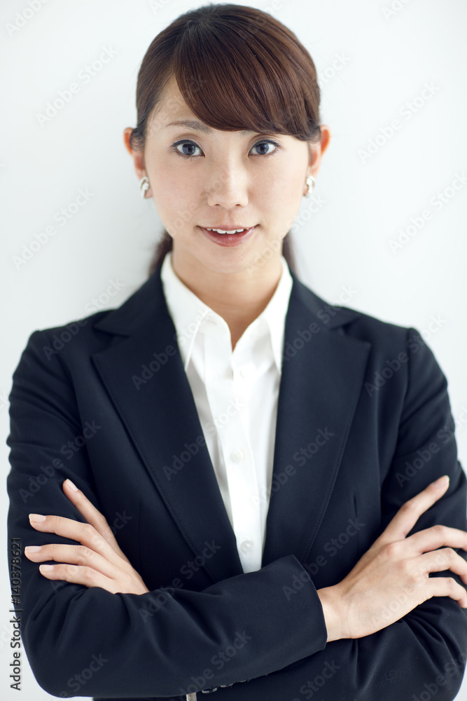 Portrait of a business woman with arms crossed Portrait of a business woman with arms crossed