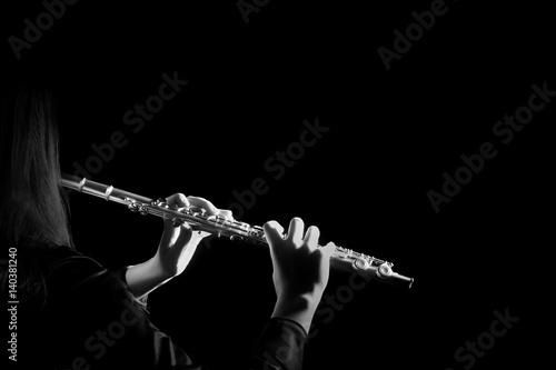 Flute instrument Flutist playing flute music photo