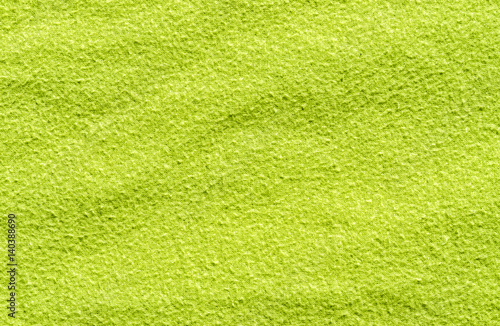 Rough and wrinkly textile green abstract texture