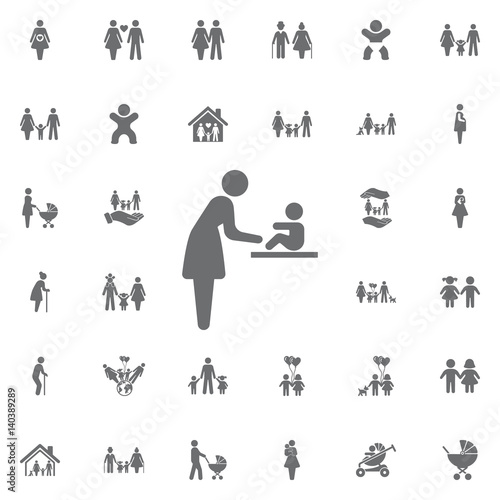 Woman and baby Changing diapers Vector icon. Set of family icons