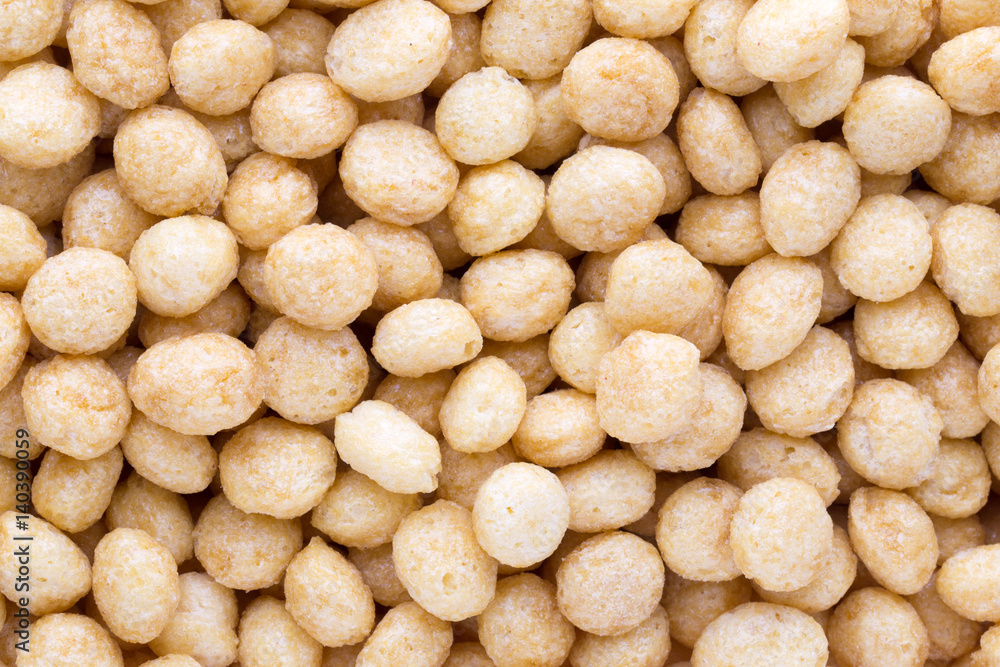 Corn flakes rings on the background. Corn flakes rings on the background.