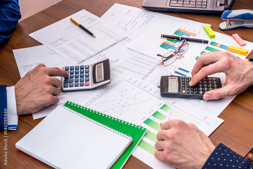 The team analyzes the business expenses of the annual budget. The team analyzes the business expenses of the annual budget.