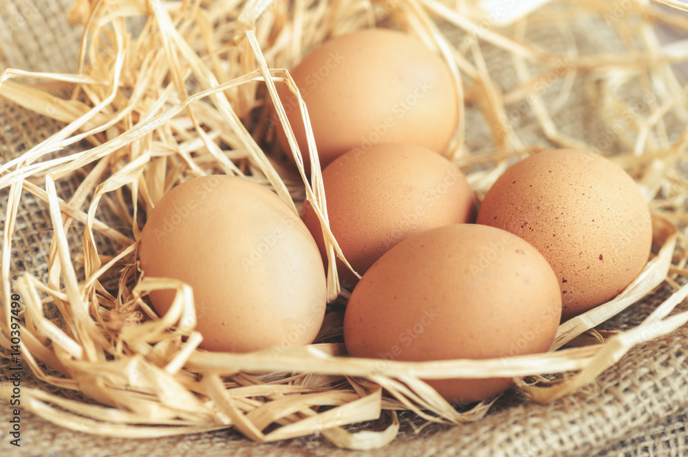 Eggs over jute sack background. Happy easter. Eggs over jute sack background. Happy easter.
