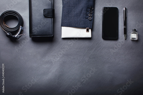 Men's accessories - smartphone, cufflinks, shirt, pen, jacket.