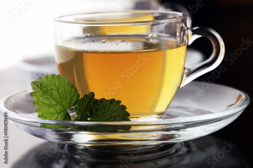 Herbal dry sri lanka tea. Mint leaf. Tea in a glass cup, mint leaves, dried tea, in a restaurant or teahouse