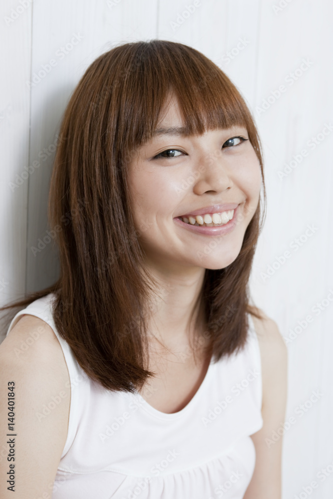Portrait of a young woman smiling Portrait of a young woman smiling