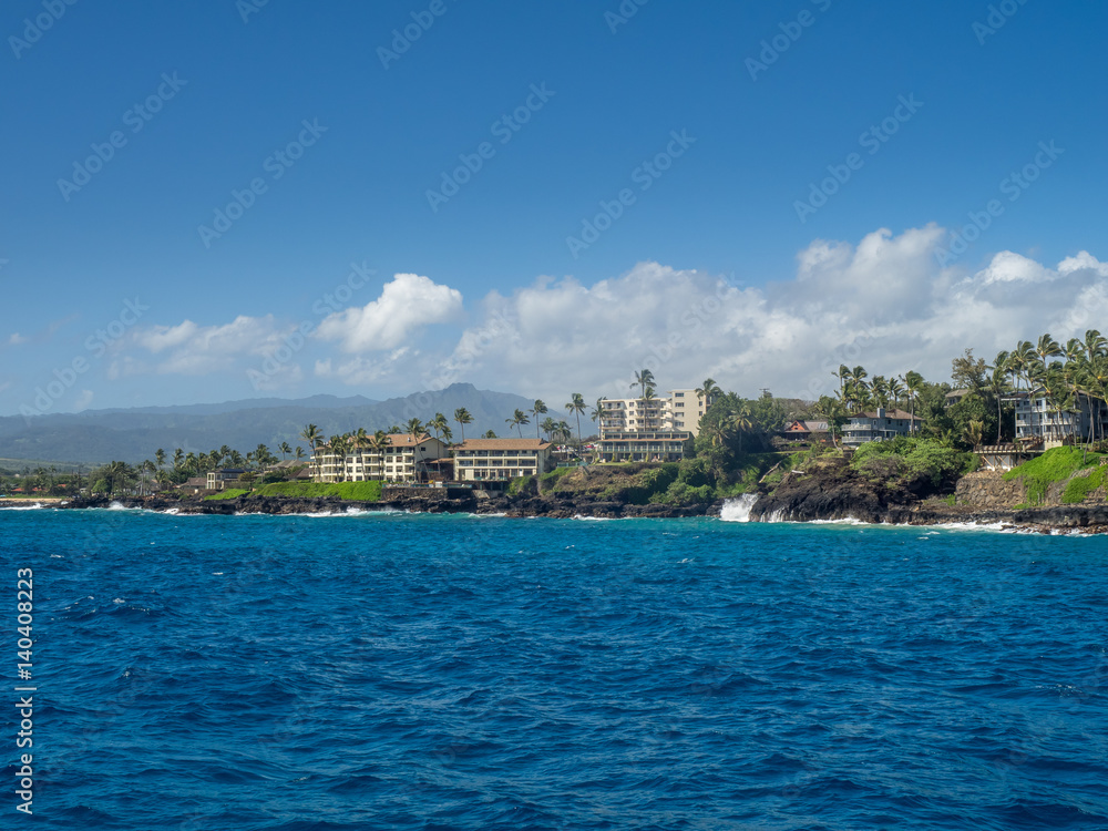 Condominiums along the ocean at Poipu, Kauai. 