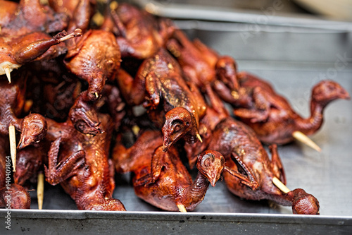 Grilled whole birds on chinese street 