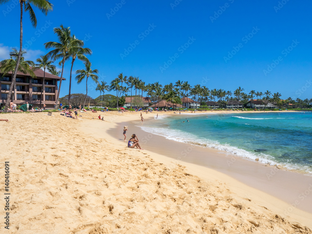 View of famous Poipu beach on Kauai island in Hawaii. 