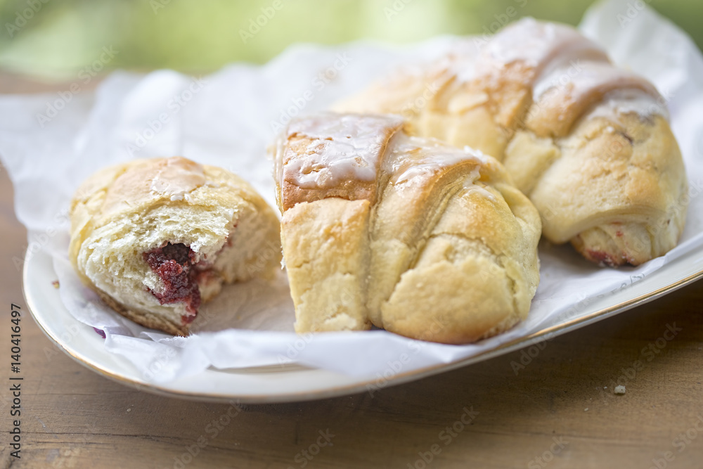 Croissant with strawberry jam