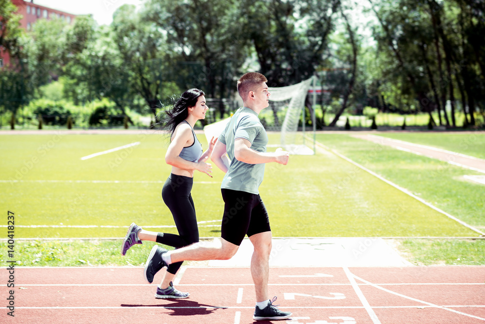 Obraz premium Running couple outdoors.