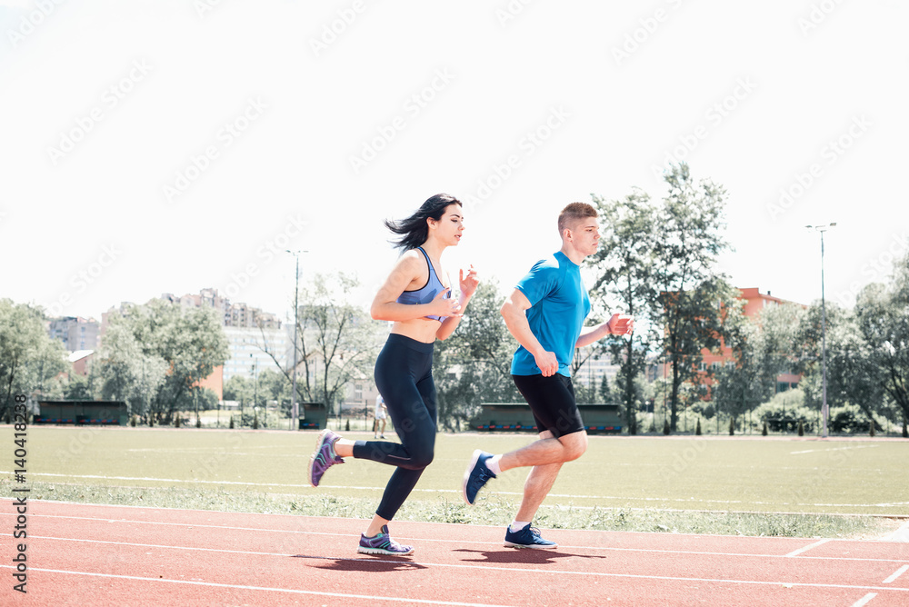 Fototapeta premium Running couple outdoors.