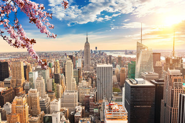 Fototapete New York Manhattan im glühenden Abendlicht  © sborisov