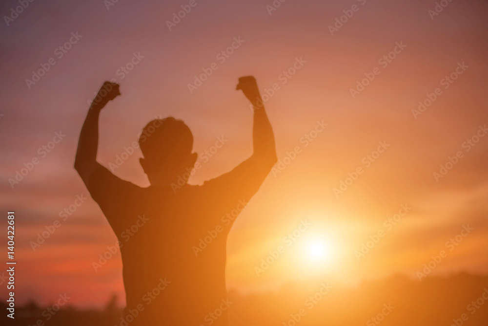 Fototapeta premium Man show hands silhouette sunset background 