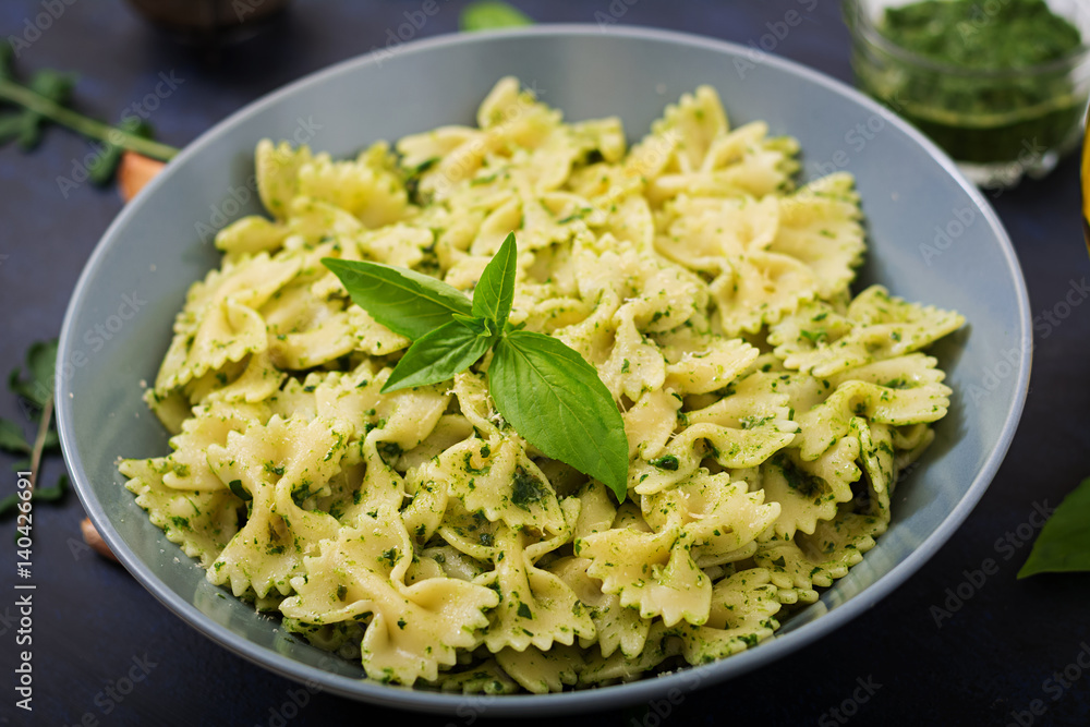 Vegan Farfalle pasta in a basil-spinach sauce with garlic Vegan Farfalle pasta in a basil-spinach sauce with garlic