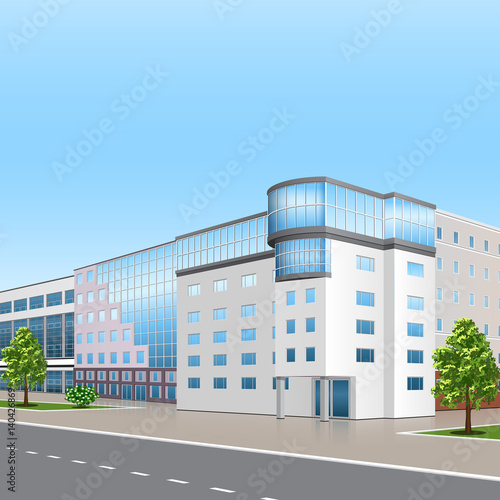 office building with the entrance and a reflection