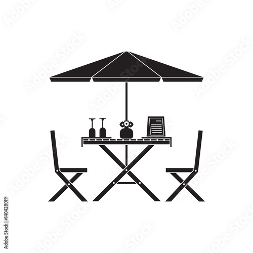 Outdoor romantic table and chairs under parasol with menu, wine bottle and glasses. Summer street cafe terrace silhouette.