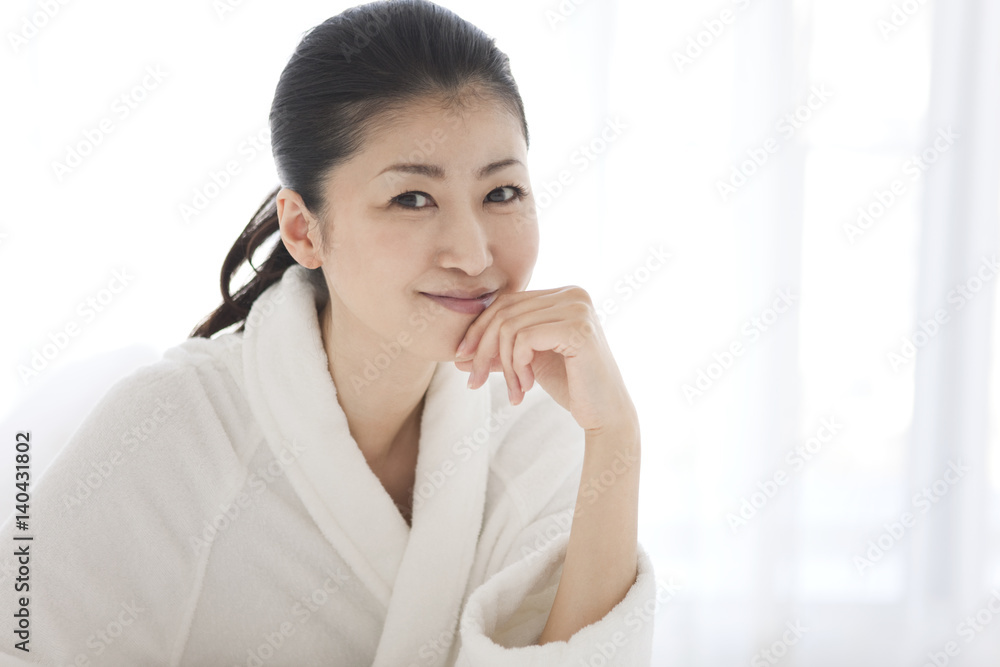 Portrait of woman with hand on chin Portrait of woman with hand on chin
