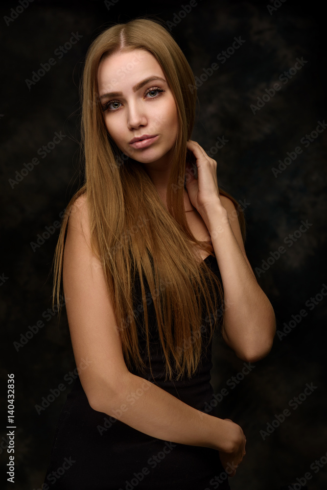 Beauty portrait of a young woman with long hair Beauty portrait of a young woman with long hair