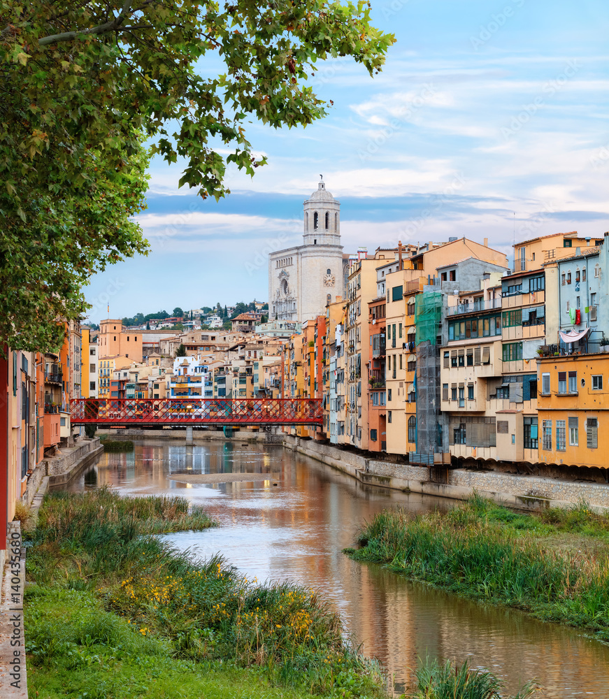 historical jewish quarter in Girona with Eiffel Bridge at sunrise, Barcelona, Spain, Catalonia