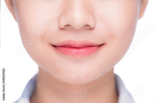 Natural lips. Close up shoot in studio on white