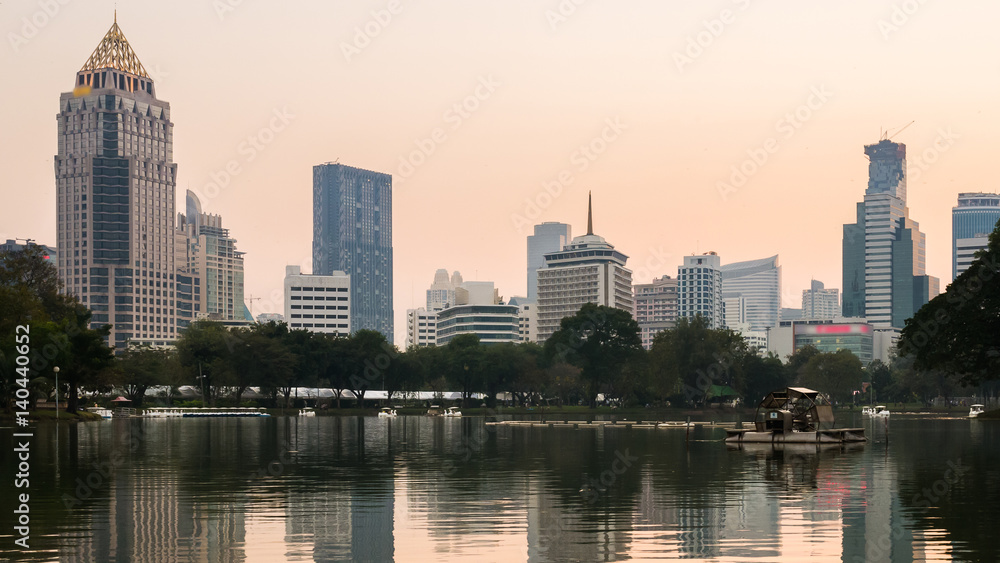Sunset skyline from Lumpini park at Bangkok, Thailand Sunset skyline from Lumpini park at Bangkok, Thailand