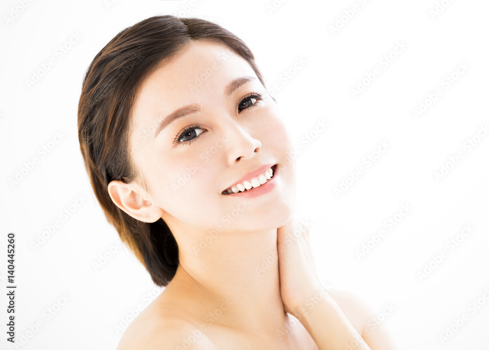 closeup young smiling woman face isolated on white closeup young smiling woman face isolated on white