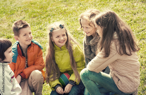 Group of children laughing in spring park
