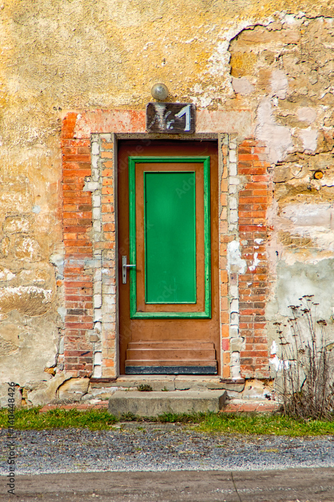 Fototapeta premium Old green wooden door