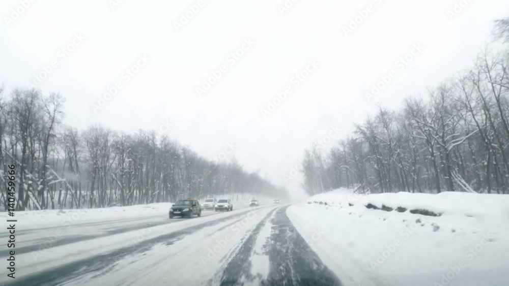 Driving POV on snowy country road. Winter Snow Mountain Road Driving. Forest. Driving time lapse Driving POV on snowy country road. Winter Snow Mountain Road Driving. Forest. Driving time lapse