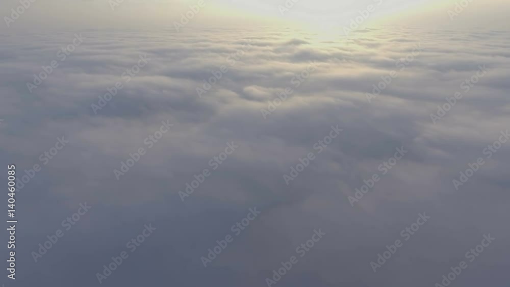 Flight over field of clouds in sunrise time. Flight over field of clouds in sunrise time.