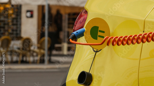 Power supply for electric car charging. City electric car charging station. Close-up.