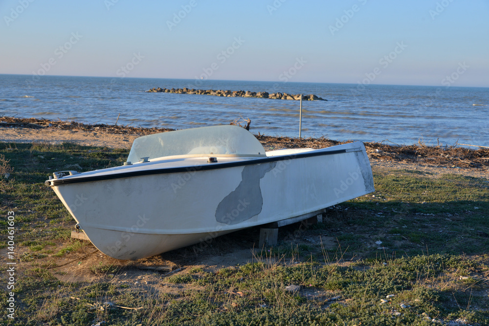 isolated wooden boat on the beach isolated wooden boat on the beach