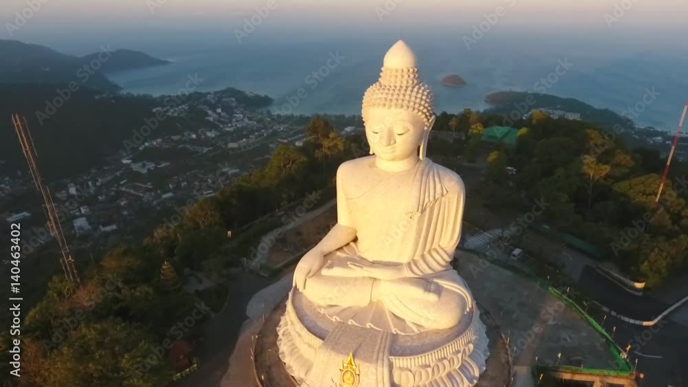 Famous White Big Buddha Marble Statue. HD Aerial Fly Away View During Sunrise. Phuket, Thailand. Famous White Big Buddha Marble Statue. HD Aerial Fly Away View During Sunrise. Phuket, Thailand.