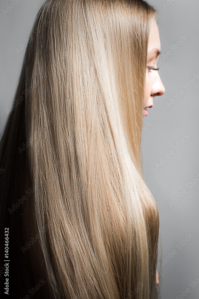 Very long beautiful shiny hair. Portrait of a blonde with long straight hair  Stock Photo | Adobe Stock