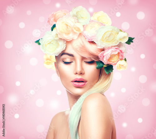 Beauty summer model girl with colorful flowers wreath. Flowers hair style
