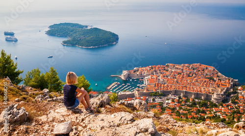 young woman enjoying the view of the Dubrovnik Old Town photo