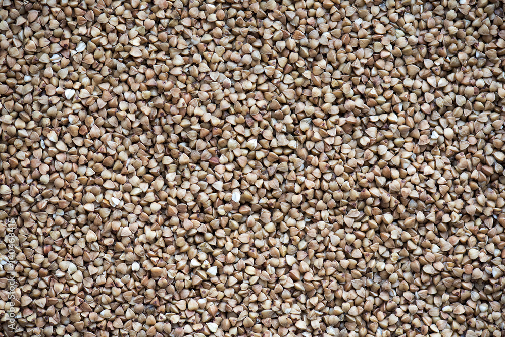 Buckwheat, food background, texture, natural brown color Buckwheat, food background, texture, natural brown color