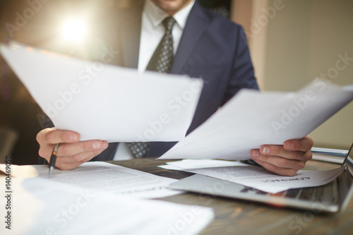 Photography Closeup portrait of unrecognizable successful businessman wearing black formal s