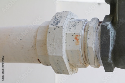 Close up joint pipe old select focus with shallow depth of field industrial tap water