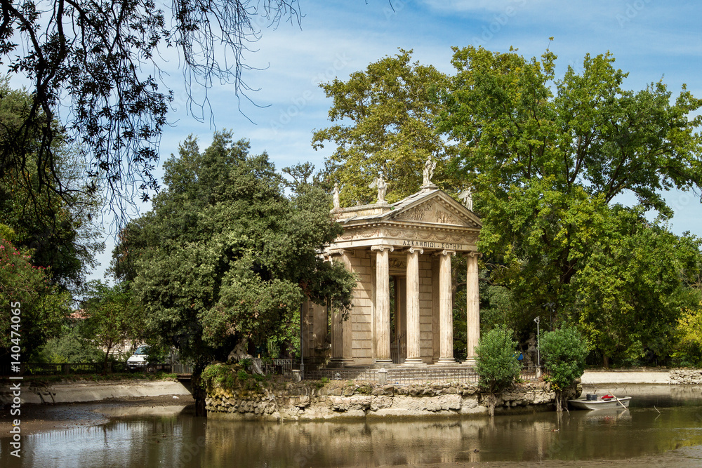 Small classical Roman pavilion in a lake Small classical Roman pavilion in a lake