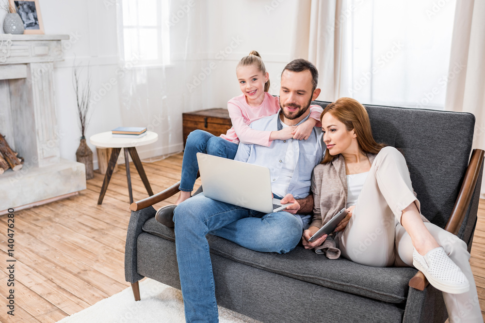 Family using laptop