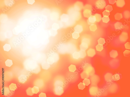 hexagon bokeh effect background banner in shades of creamy yellow, orange, and white